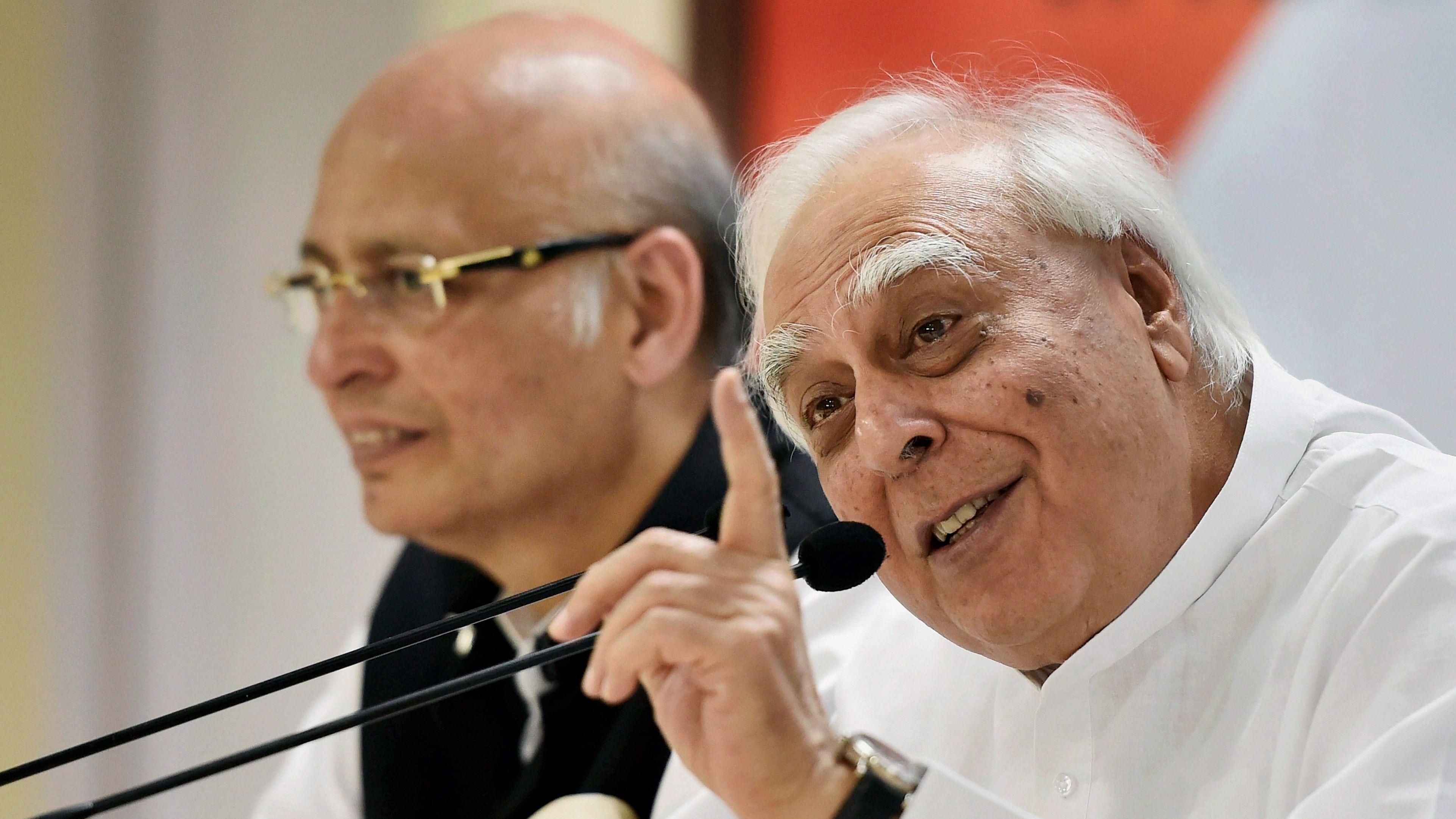 <div class="paragraphs"><p>Congress senior leaders Abhishek Manu Singhvi and Kapil Sibal during a press conference.</p></div>